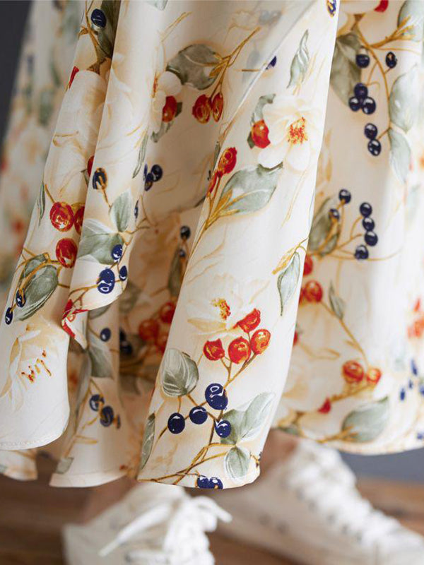 Abito salopette lungo in denim patchwork con stampa acquerello