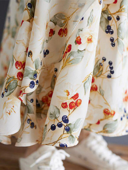 Robe salopette maxi patchwork en denim et imprimé aquarelle
