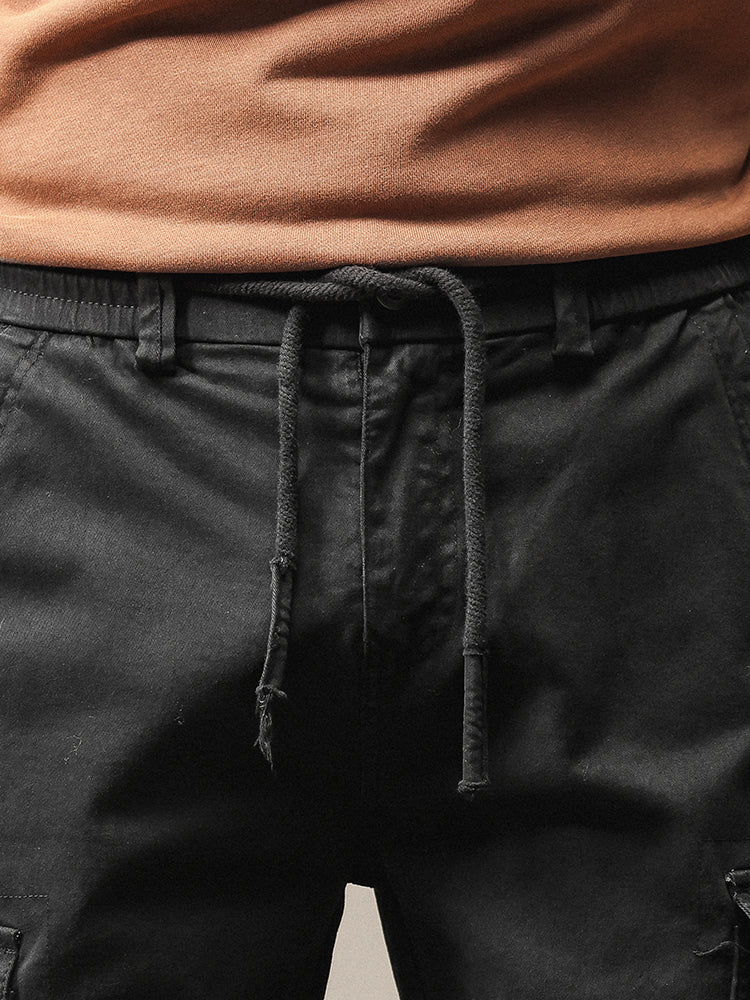 Pantalon de jogging cargo fuselé pour homme, style vintage, poches multiples et boutons
