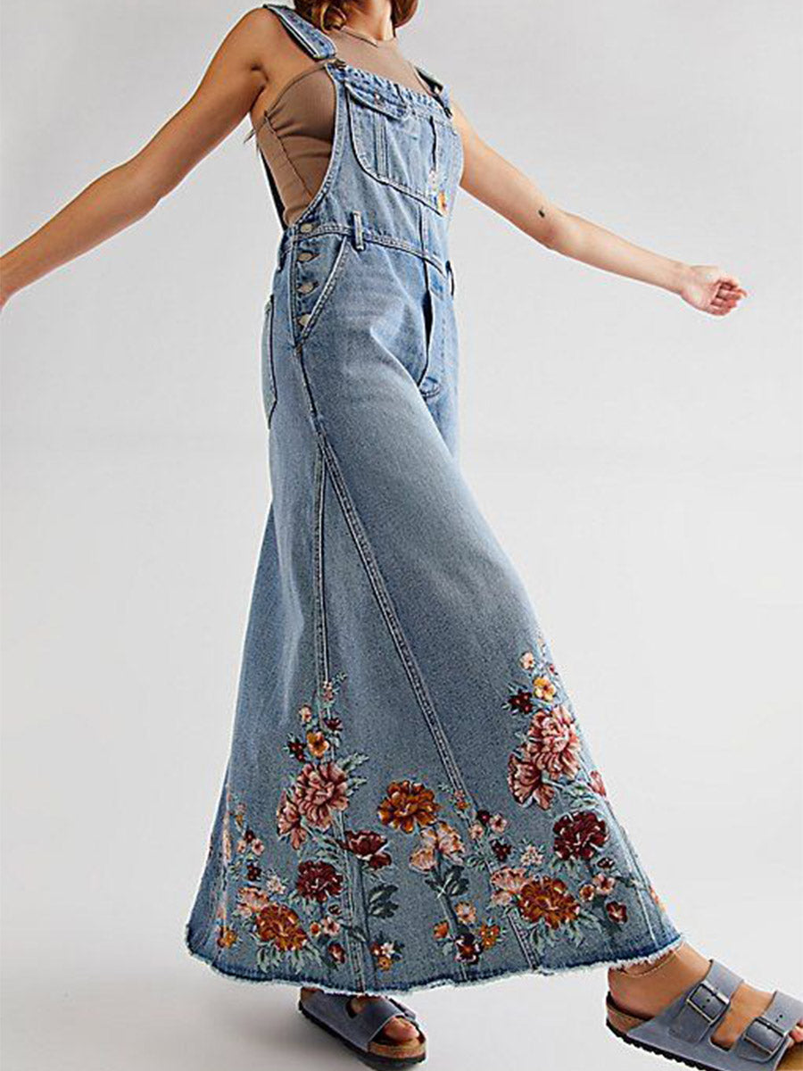 Abito salopette in denim ricamato con motivi floreali