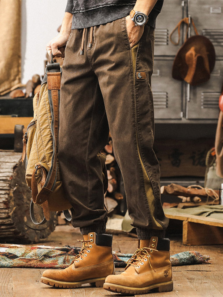 Pantalon de jogging pour homme avec bandes latérales et effet délavé vintage