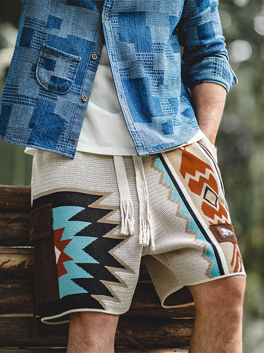 Pantaloncini con coulisse e motivo geometrico a contrasto