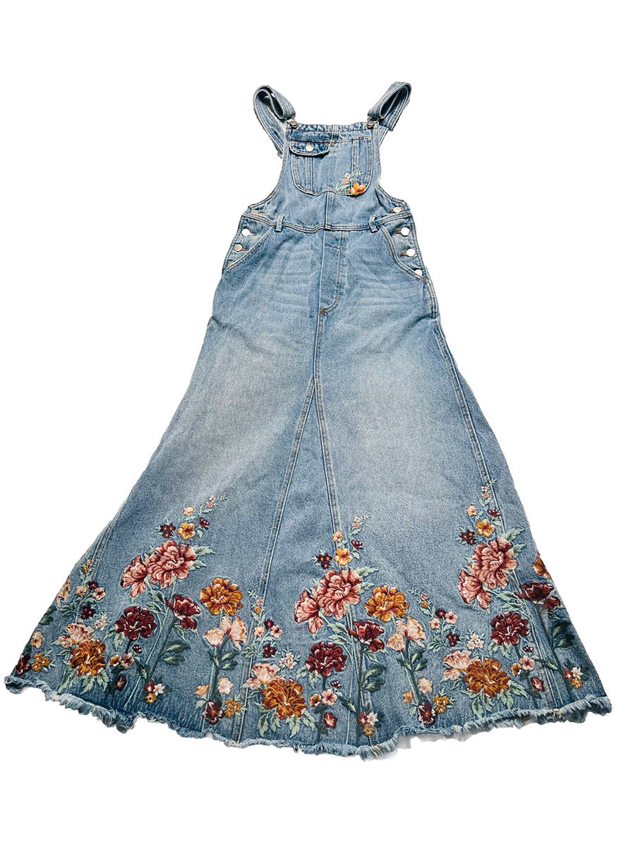 Abito salopette in denim ricamato con motivi floreali