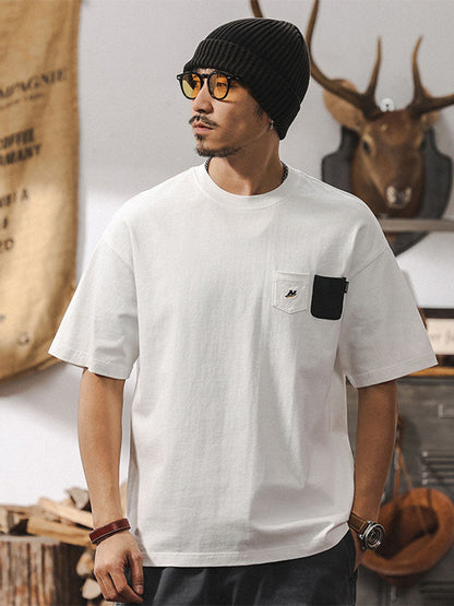 T-shirt à manches courtes pour homme avec poches contrastées et coupe ample