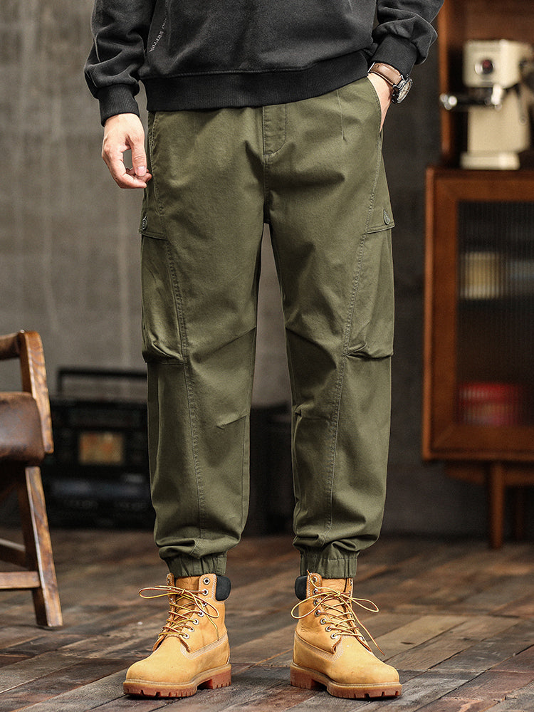 Pantalon cargo fuselé à taille élastiquée et boutons décoratifs pour homme