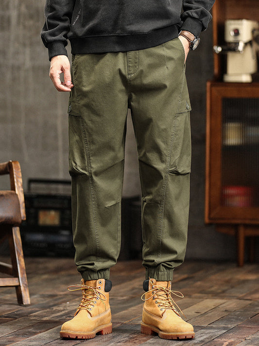 Pantalon cargo fuselé à taille élastiquée et boutons décoratifs pour homme