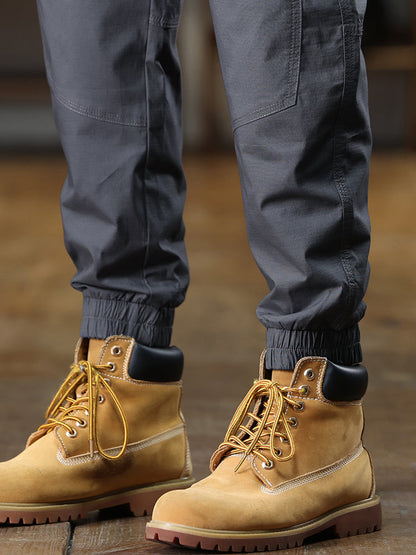 Pantalon cargo fuselé à ourlet élastique et étiquette patch pour homme
