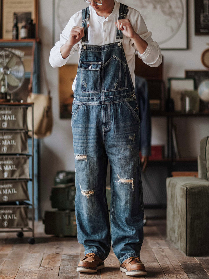 Salopette in denim usurato da uomo