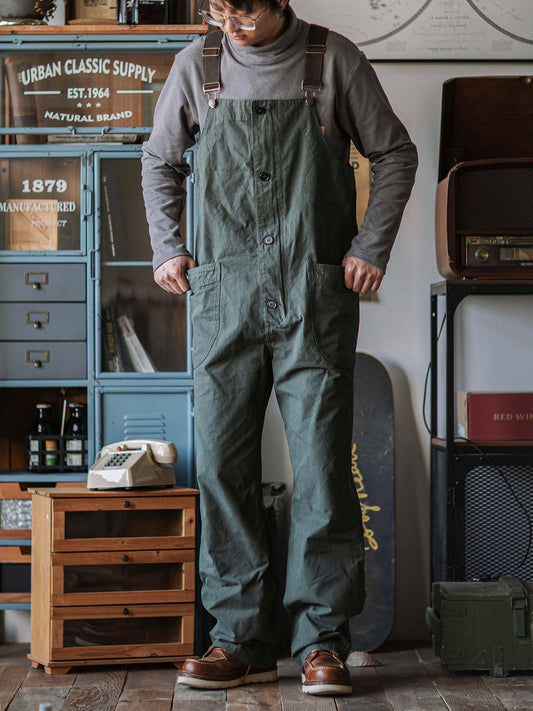 Leichte Canvas-Latzhose mit abgerundeter aufgesetzter Tasche